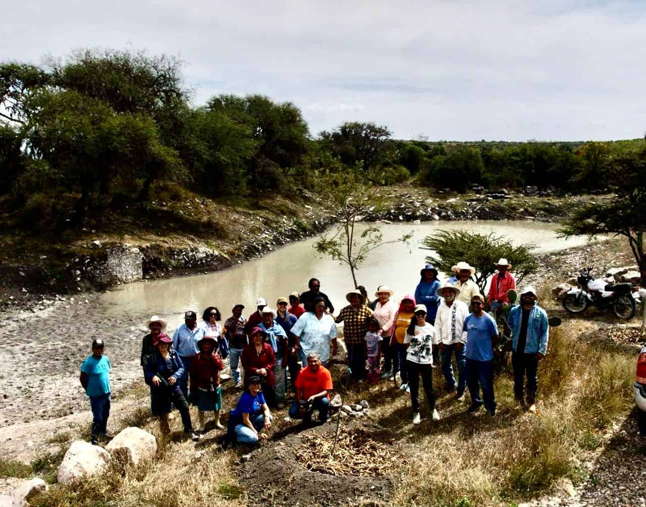 Community river cleanup event in Mexico, environmental conservation effort. Community river cleanup, environmental conservation, Mexico.